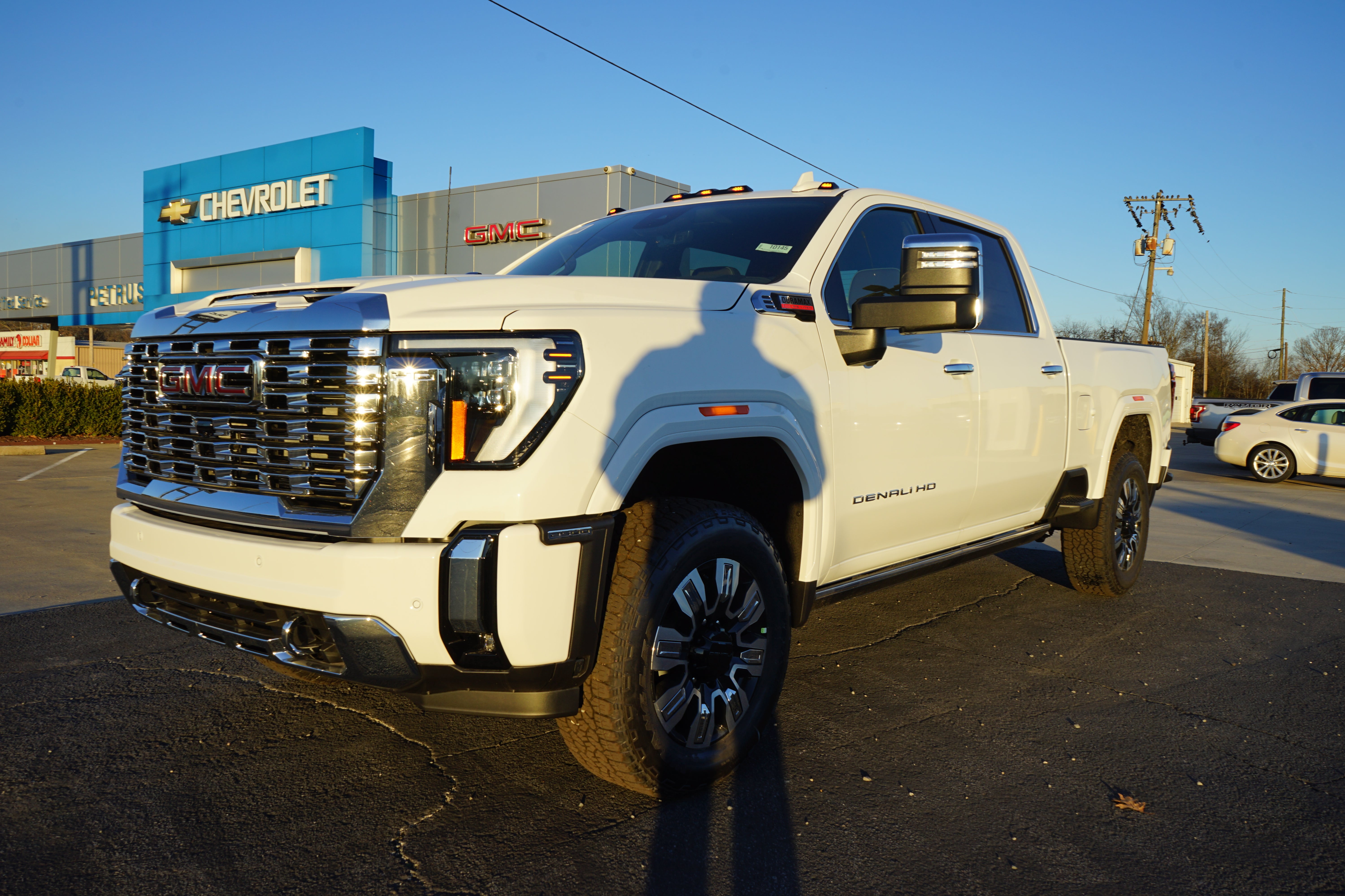 2026 GMC Sierra 2500 HD Denali in Summit White — front three-quarter view