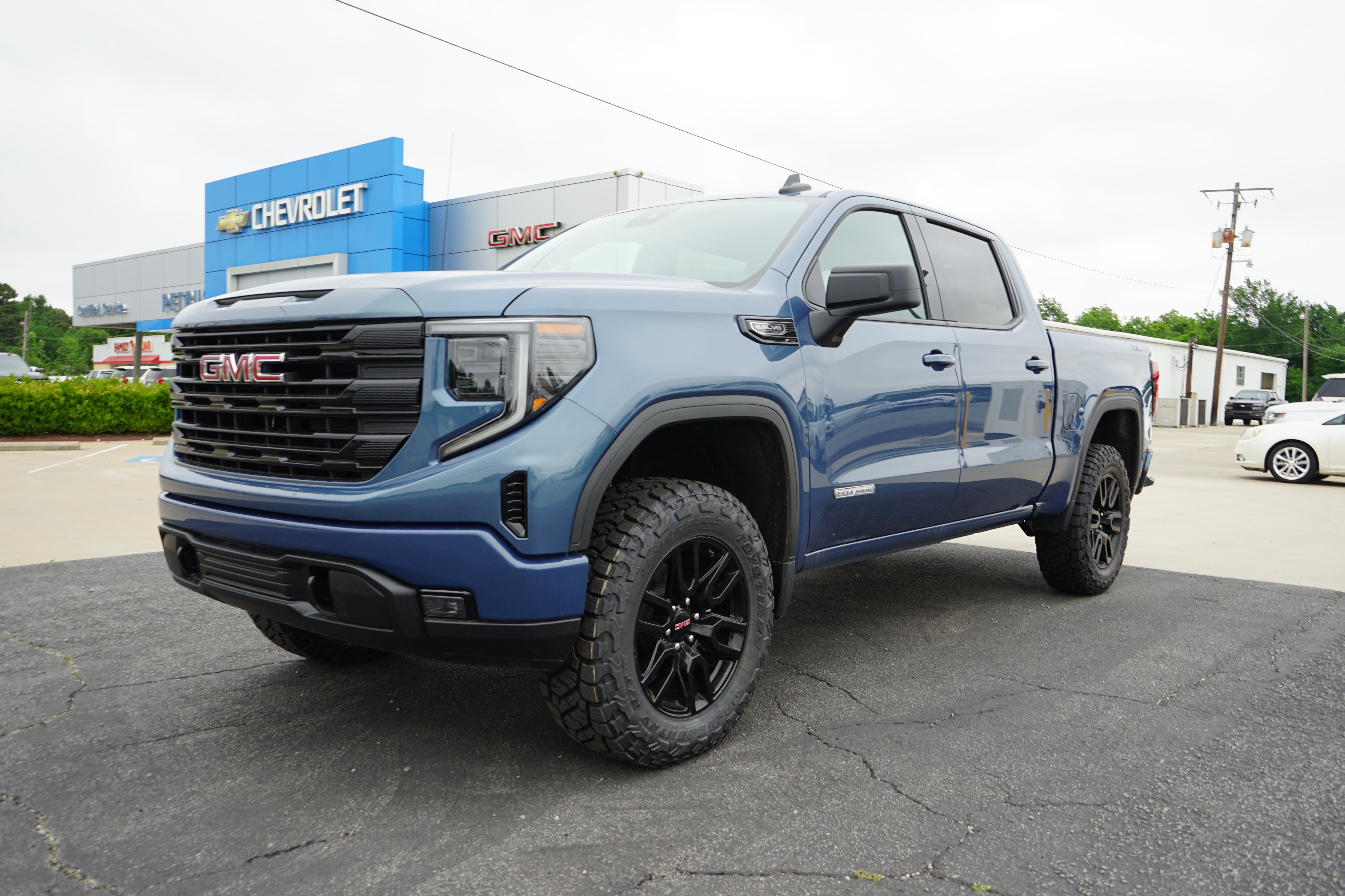 2026 GMC Sierra 1500 Elevation in Downpour Metallic — front three-quarter view