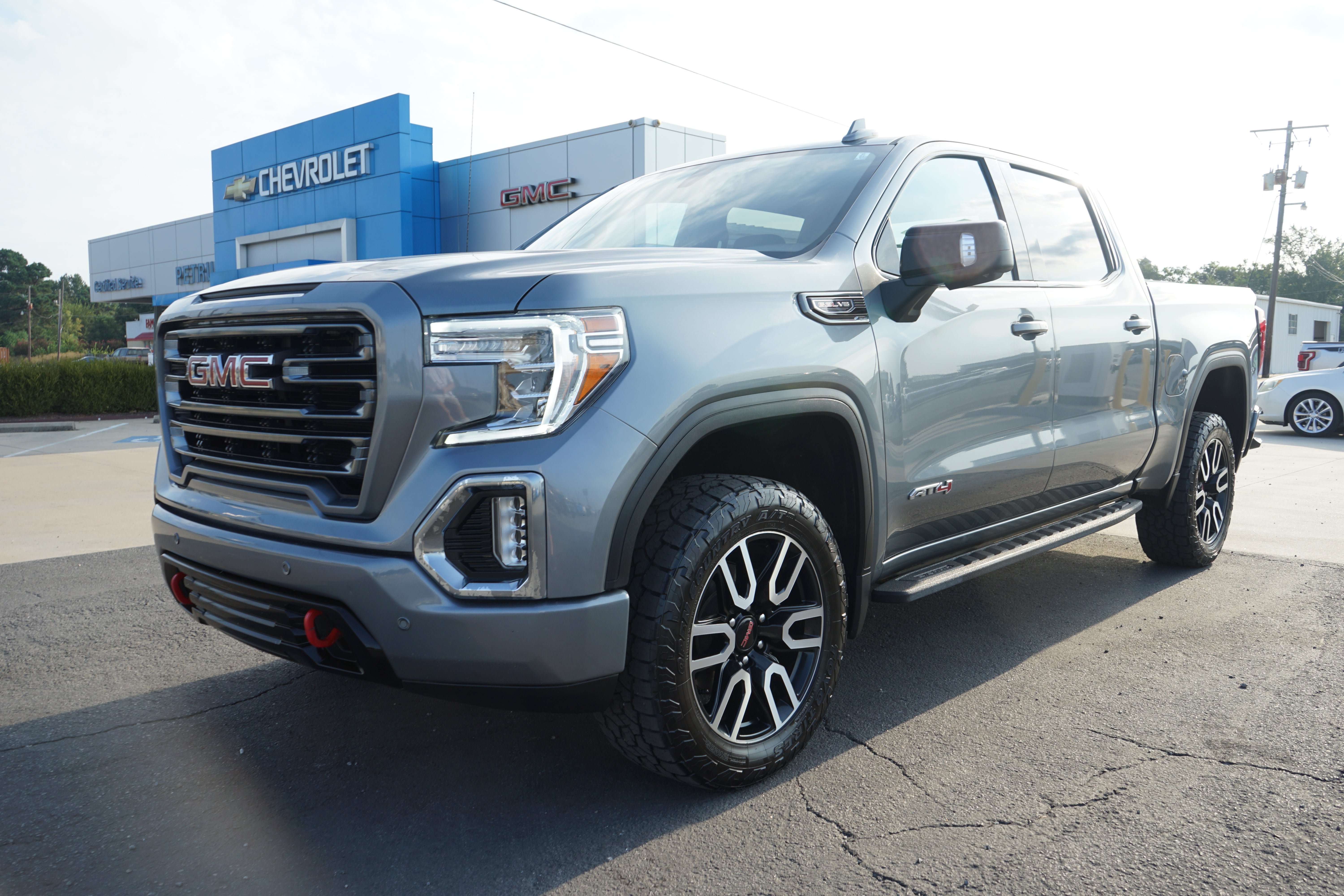 2022 GMC Sierra 1500 Limited AT4 in Satin Steel Metallic — front three-quarter view