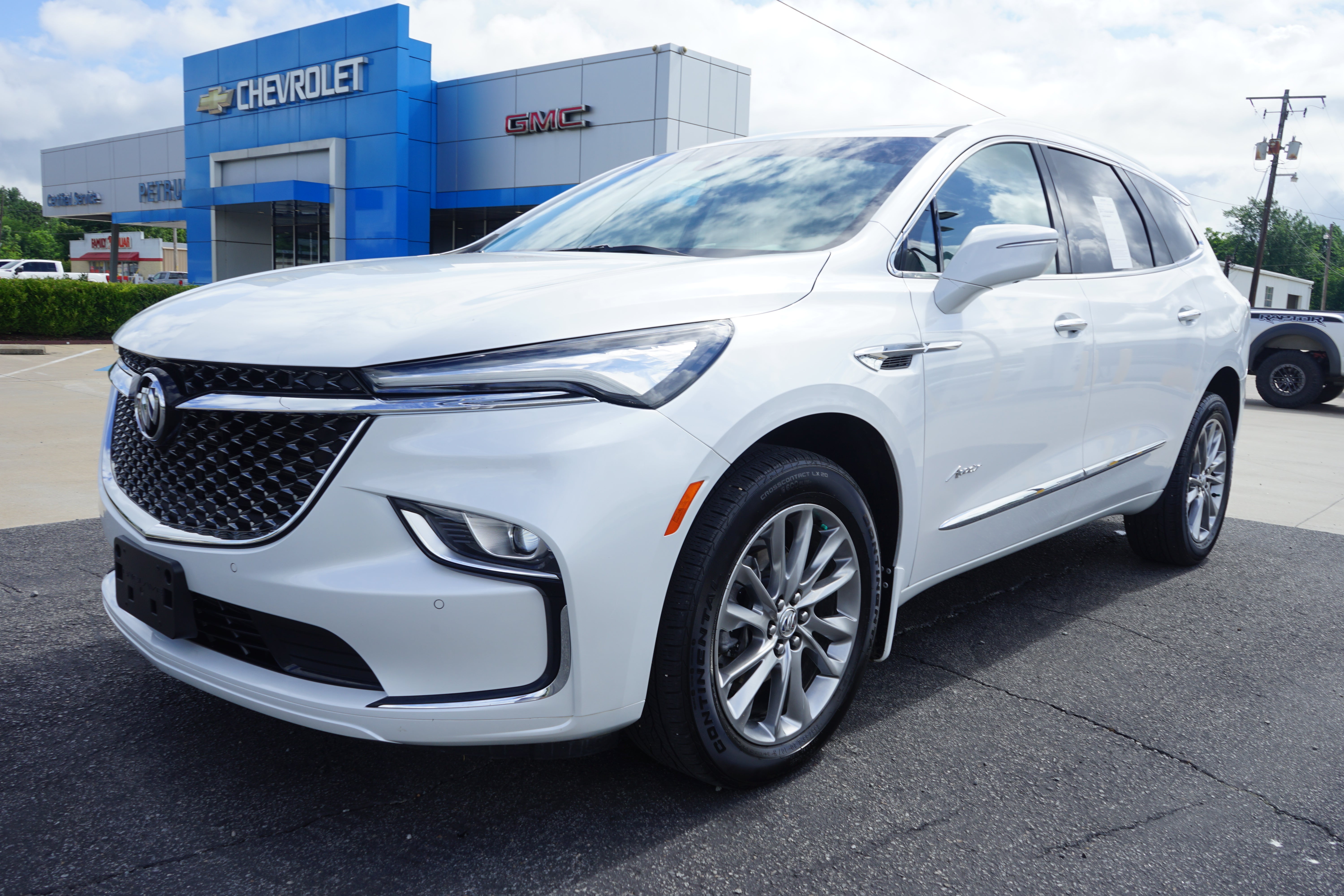2023 Buick Enclave Avenir in White Frost Tricoat — front three-quarter view